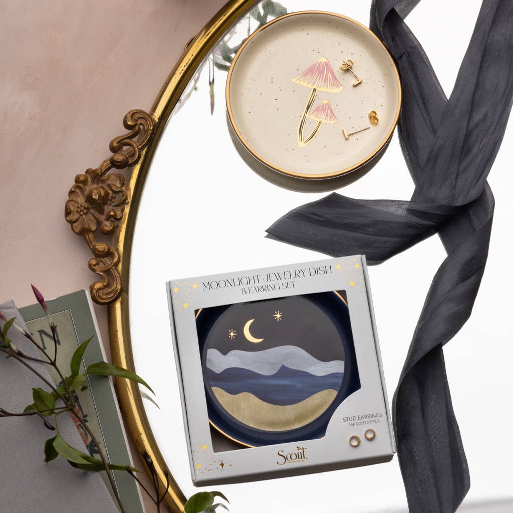 A gold-edged mirror reflects a box labeled 