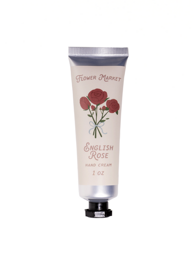 Tube of Flower Market English Rose Hand Cream, 1 oz, featuring a vintage-inspired design with red rose illustrations and soft beige packaging.