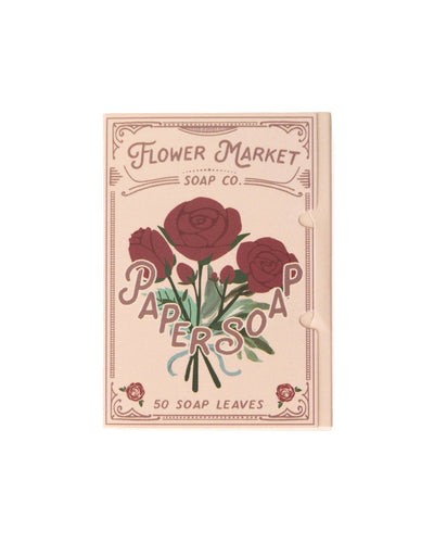 Flower Market Rose Paper Soap packaging featuring vintage-inspired illustrations of deep red roses tied with a blue ribbon, accompanied by elegant lettering stating '50 Soap Leaves' for an eco-friendly cleansing experience.