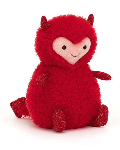 Front-facing Hugg McSnugg plush featuring a heart-shaped pink face, glittery red horns, and a soft, round body.